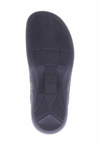 Black rubber shoe sole featuring a textured grip with geometric patterns, marked with "Fun Comfort" and size "36" near the center.