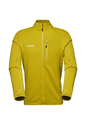Chaqueta amarilla con cremallera, de superficie texturizada, con cremallera de media longitud, bolsillo lateral y detalles de costura en contraste.
