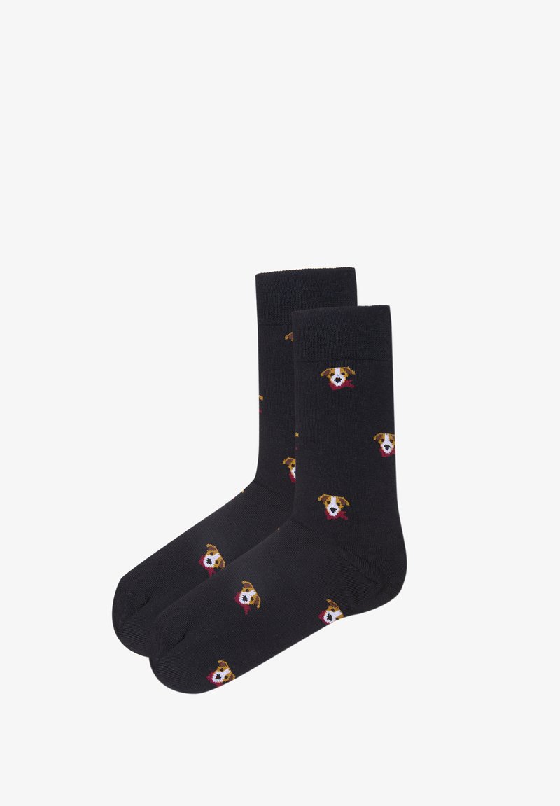 Black crew socks with repeated small dog faces wearing red scarves patterned across the fabric.