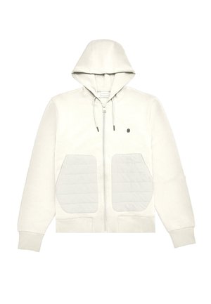 Fehér cipzáras kapucnis pulóver elöl kenguruzsebbel, párnázott részletekkel. Kötött kapucnival és bordázott mandzsettákkal, valamint szegéllyel rendelkezik.