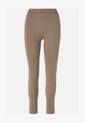 Beige legging met een hoge tailleband, gekenmerkt door een geribde textuur en een gladde afwerking, ontworpen met subtiele vormgevende details langs de zijkanten.