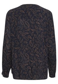 Blouse bleu marine avec un motif cachemire en rouille et beige, manches longues, coupe ample, et poignets boutonnés. Tissu texturé avec une finition douce.