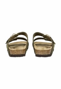 Sandali in suede verde con due cinture regolabili, soletta in sughero e suola in gomma nera texturizzata. Presentano un accento in metallo sulla fibbia.