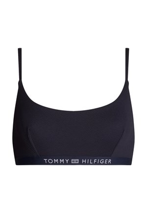 Braletă bleumarin cu textură, bretele ajustabile și bandă cu logo-ul alb "TOMMY HILFIGER". Design fără sârmă pentru confort.
