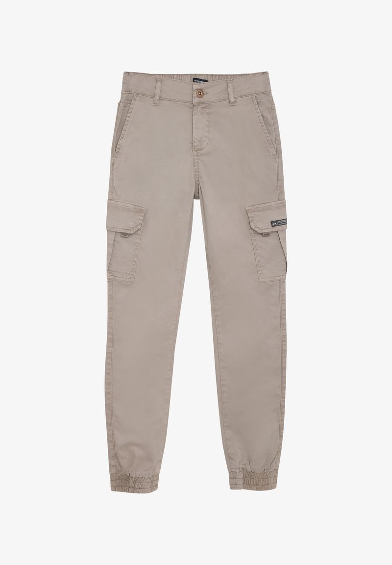 Pantalons cargo beige en tissu doux, avec des poignets élastiques, deux poches latérales et deux poches cargo avec un petit détail d'étiquette.