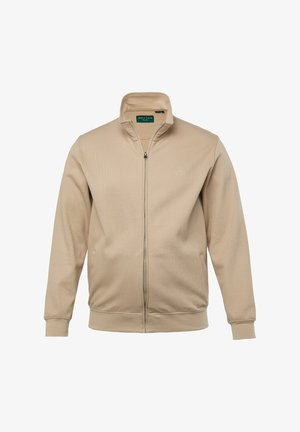 Beige Zip-Jacke aus geripptem Stoff mit hochgeschlossenem Kragen, elastischen Bündchen und einem auf der linken Brust aufgestickten Logo.