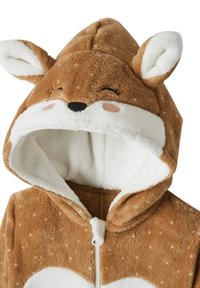 Soft brown and white hooded zip-up garment with deer face, ears, and closed eyes design on the hood.