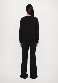 Versace Jeans Couture Sweatshirt - black/gold