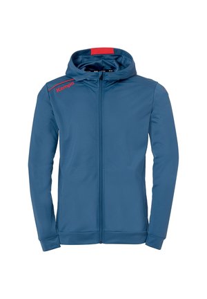 Blauer Sportjacke mit Reißverschluss und Kapuze, langen Ärmeln, rotem "Kempa"-Logo auf der linken Schulter und rotem Aufnäher auf der Kapuze.