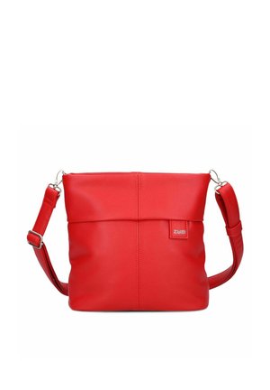 Red leather crossbody bag with adjustable strap and small logo patch on the front, minimalist design with subtle stitching details.