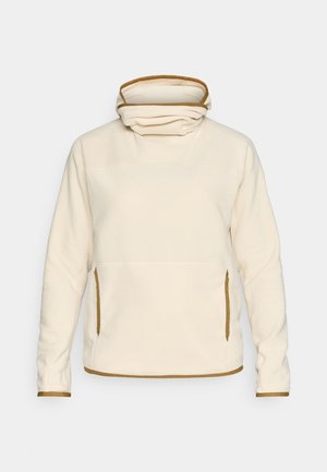 Crème fleece pullover met een hoge kraag, voorzien van bruine accenten op de kraag en manchetten, en zijzakken voor opbergruimte.