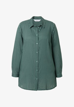 Vihreä raidallinen pitkähiha, napitettava etuosa ja klassinen kaulus. Valmistettu sileästä kankaasta, jossa on rento istuvuus.