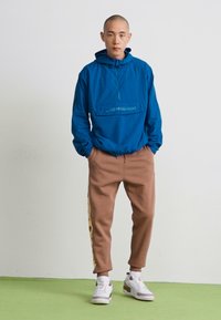 Jordan Trainingsbroek - archaeo brown/orange chalk