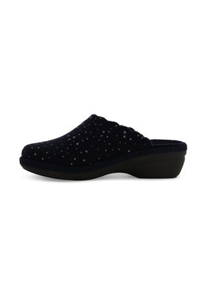 Zoccoli blu navy slip-on realizzati in morbido tessuto con superficie testurizzata, decorati con accenti a pois argentati e suola nera curva bassa.