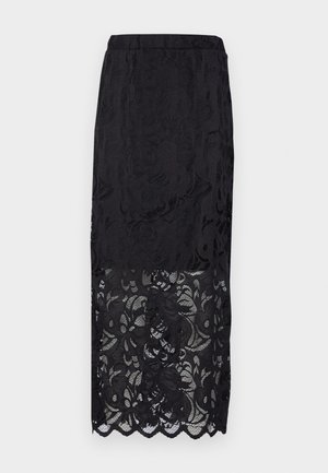 Jupe en dentelle noire avec des motifs floraux, une taille ajustée et un ourlet festonné. Texture légère et semi-transparente dans la partie inférieure.