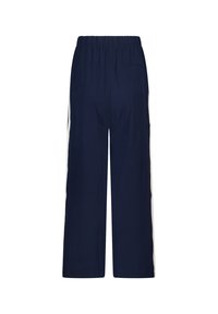 Navy blue trousers made of soft fabric, featuring an elastic waistband, wide-leg design, and white side stripes for contrast.