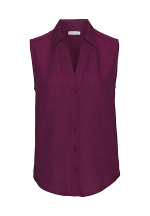 Sleeveless blouse in dark purple fabric with a V-neck, button closure, and curved hem; smooth texture with a clean, simple design.