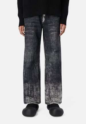 Flared Jeans - schwarz weiß