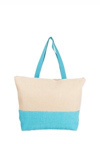 Bolsa de lona con una sección superior crema y un fondo tejido turquesa, con dos asas turquesas y cierre de cremallera.