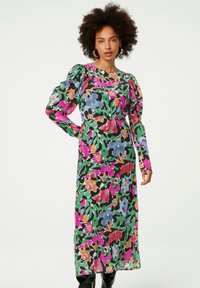 Bloemendress met puff-mouwen, meerkleurige patronen in roze, groen, blauw en oranje; lange lengte, gemaakt van lichtgewicht stof, aansluitende taille.