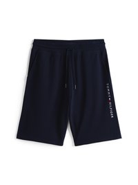 Pantaloni corti in felpa blu navy realizzati in tessuto morbido, con vita elastica e coulisse e tasche laterali; logo "TOMMY HILFIGER" lungo il lato.