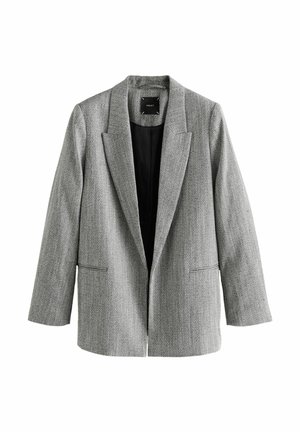 Blazer gris en chevron avec revers en crans, manches longues et poches passepoilées à l'avant, doublé en tissu noir et sans boutons visibles.