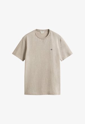 T-shirt en coton beige à manches courtes, col rond et petit logo brodé sur la poitrine gauche.