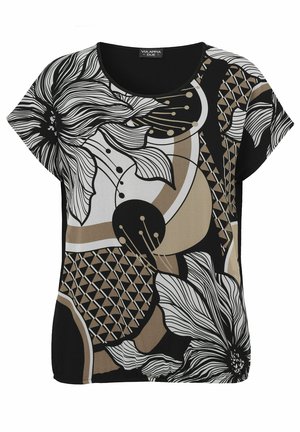 Kurzärmlige Bluse mit schwarzen, beigen und weißen Blumen- und geometrischen Mustern, die große umrissene Blumen und abstrakte Formen zeigen.