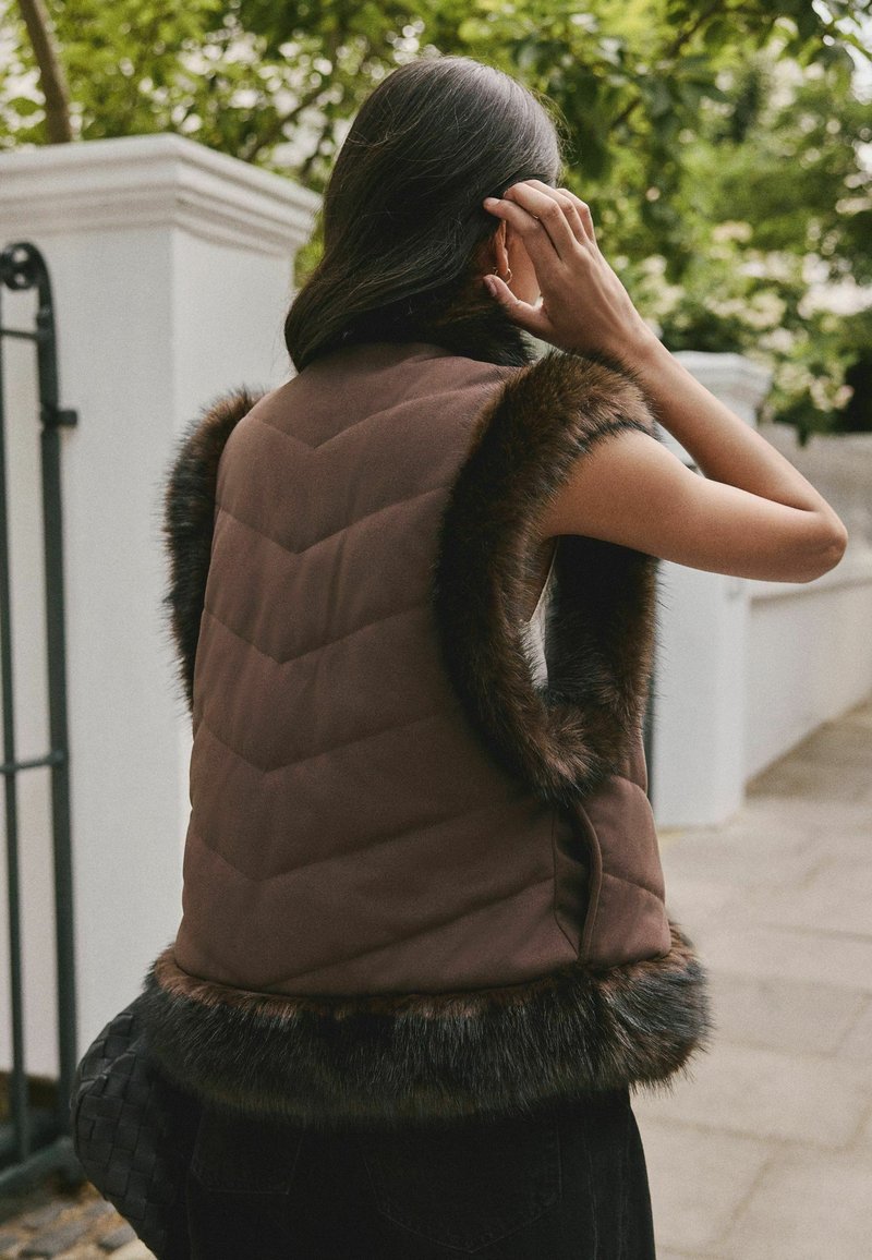 HIGH CURL VEST W - warm amber XS - Fleece bodywarmer Dames Fleece bodywarmer Dames – JACK WOLFSKIN