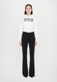 Versace Jeans Couture Leggings - Trousers - black