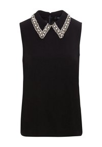 Svart ärmlös topp med en pärlade krage med vita och silverfärgade accenter, slät tyg och dragkedja i ryggen.