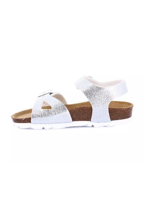 Sandali argentati con glitter, suola in sughero, cinturini regolabili e suola in gomma bianca. Presentano un design a intaglio e una costruzione robusta.