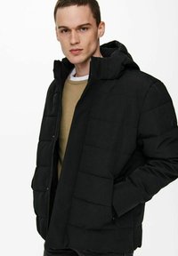 Black puffer jacket with a hood, featuring a quilted design and front zipper closure. Material has a smooth texture, suitable for cold weather.