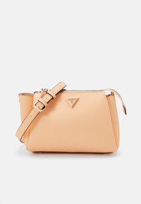 Guess IWONA Cross body bag peach/apricot Zalando