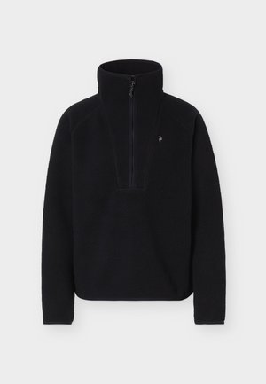 Melns vilnas džemperis ar garām piedurknēm, augstu apkakli un pusē rāvējslēdzēja priekšpusē, attēlots uz vienkārša gaiša fona.