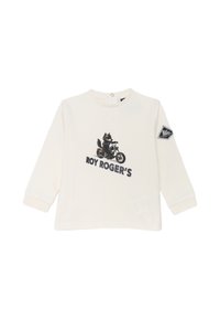 Maglietta a maniche lunghe crema in cotone, con una grafica di motocicletta e il testo "ROY ROGER'S". Include un patch con logo a diamante sulla manica.