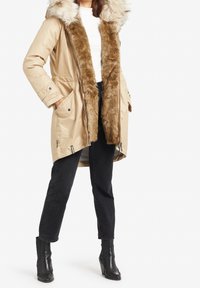 khujo Vinterkappa /-rock - beige