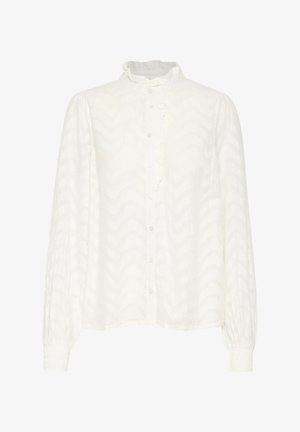 Blusa bianca con un motivo zigzag testurizzato, placca arricciata, chiusura a bottoni e maniche lunghe elasticizzate. Tessuto morbido e leggero.