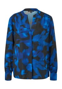 Blouse à manches longues avec col mandarin, présentant un motif abstrait noir et bleu électrique et des poignets boutonnés.