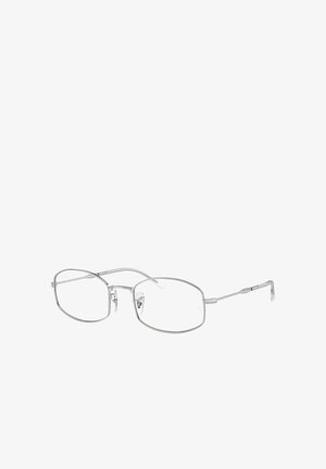 Occhiali da vista in metallo con montatura ottagonale color argento, lenti trasparenti, aste sottili e naselli regolabili per un maggiore comfort.