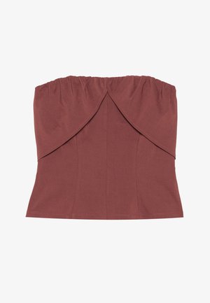 Top strapless de culoare cărămidie, cu decolteu strâns, corp ajustat și design frontal suprapus. Fabricat dintr-un material neted și flexibil.