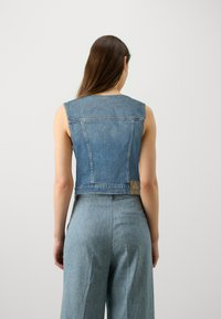 Guess EVA - Top - on the side