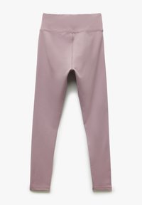 Leggings de color malva claro con una cinturilla alta, hechos de una tela lisa y elástica. Sin estampados, con costuras cuidadas y un diseño ajustado.