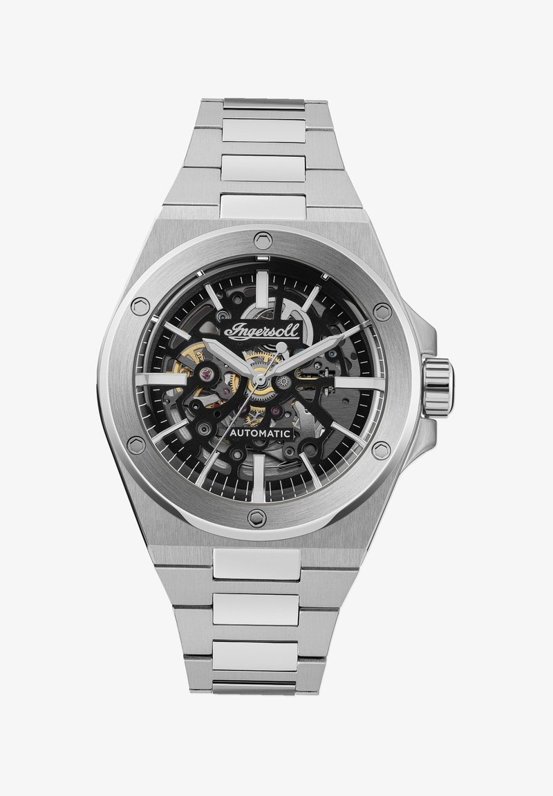 Automatisch horloge met een zilveren roestvrijstalen kast en armband, zwarte skeleton wijzerplaat, zichtbare beweging en zilverkleurige accenten.