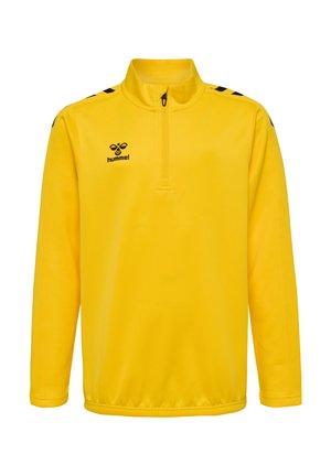 Gelber Pullover aus weichem Stoff, mit einem Viertel-Reißverschluss, schwarzen Akzenten an den Schultern und einem Logo auf der Brust. Strukturierte Oberfläche.