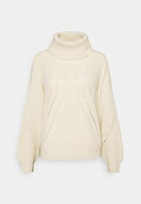 Cremefarbener, gestrickter Pullover mit hohem Rollkragen, lockerem Schnitt, strukturiertem Rippenmuster, diagonalen Mustern und Ballonärmeln.