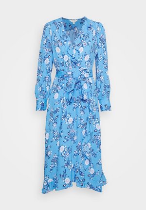 Blue midi wrap dress with white floral print, long puffed sleeves, ruffled collar, and waist tie belt.
