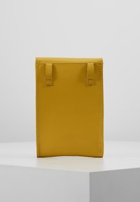 KIOMI Bältesväska - yellow
