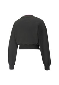 Black cropped sweatshirt with long sleeves, ribbed cuffs, and neckline. Smooth texture with a faintly scalloped hem at the waist.