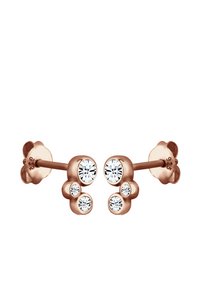 Örhängen i roséguld med tre klara, runda kristaller i varierande storlekar. Har blommiformade baksidor och graverade metallmarkeringar.